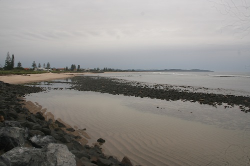 The shape of the bay looking from the beach level is very different to a top view.  Make sure you look at those shapes carefully when painting your beach landscapes.